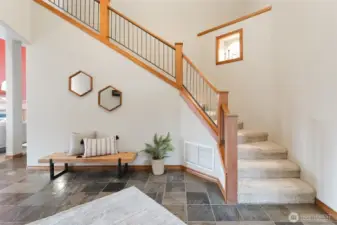 Walk into your grand entry with curved staircase