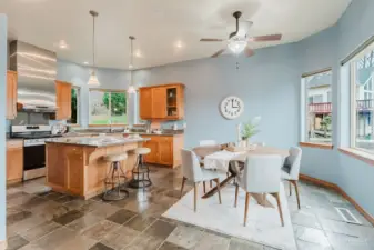 Kitchen with eating space, both room for a dining table and bar seating