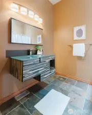 A guest 3/4 bathroom just off the hallway