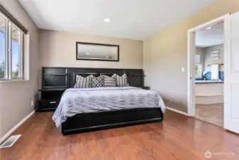 Extra-large primary suite is upstairs with full bathroom and walk-in closet.
