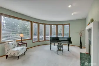 Fromal living room with beautiful picture windows overlooking the acreage