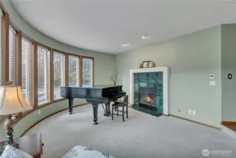 Another view the living room with gas fireplace