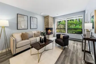 Living room has multiple configuration options, wood-burning fireplace & garden views.