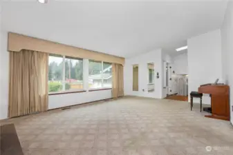 Formal living room looking back at the main entry.