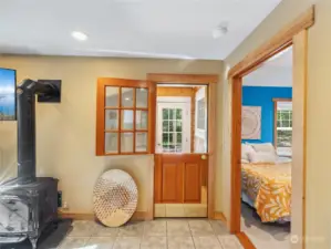 Door leading to mud room and side deck. Sauna just outside!