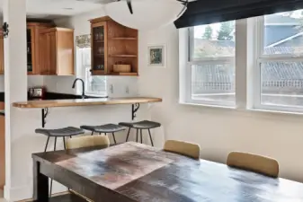 Eat-in breakfast bar in the kitchen. You will love the openness between your kitchen and dining area.