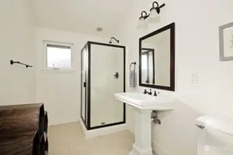 2nd Bedroom Ensuite 3/4 Bathroom with ceramic tile.