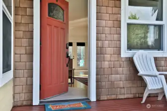 Sweet covered front porch makes a delightful entry to your home as well as a cozy place to sip your morning cup of coffee/tea. Ceramic tiled entry with bamboo flooring beyond. Come on inside!
