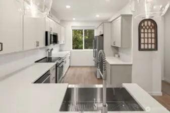 Open concept living/dining/kitchen- high ceilings, AC & tons of natural light