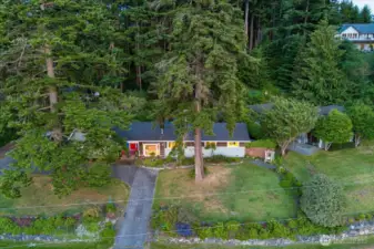 Sited on 3/4 +/- acre of treed loveliness. Property can potentially be subdivided - talk to the town planner.