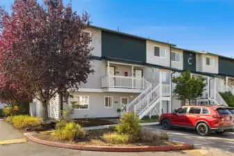 The front garden bed is yours to play with! Parking spot 74 is right out front. There is also ample guest parking in the community