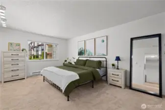 This primary suite is SO large, and this is a King-sized bed