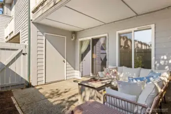 The outside patio has a walk-in storage unit, one of 2 storage spaces!