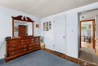 Beneath the rug, the stunning hardwood floors continue, matching the elegance found throughout the house.