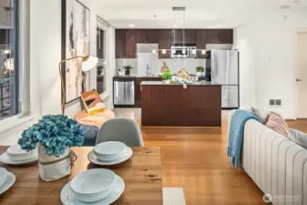 Dining, living and kitchen areas can be flexible for your needs. (photo from previous staging)