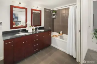 Double pocket doors between the bedroom and ensuite bath. (photo from previous staging)