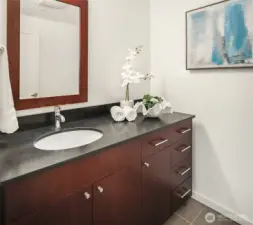 A generously sized half bath for your guests! (photo from previous staging)
