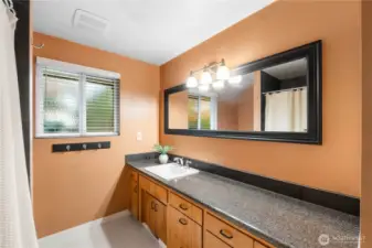 Full bath down the hall near bedrooms.