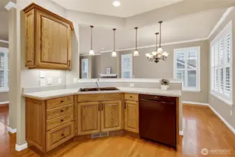Kitchen opens to dining area