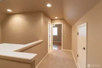 Upstairs landing and attic storage