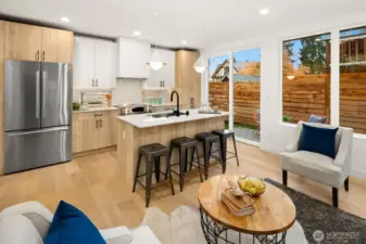 There's a slider to the patio and fully fenced sideyard and backyard.