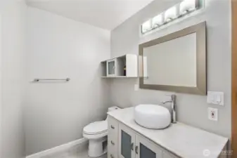 Main floor power room for guests