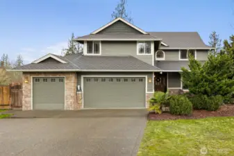 The front of the home brings both style and function. A three car garage gives you flexibility, with one single bay on one side and a two car bay on the other, perfect for daily drivers, toys, or storage that doesn’t spill into the house. The workout rack inside the garage can stay if the buyer would like. An electric car charger is already in place, the electrical panel has been recently inspected and serviced, and there’s an automatic Generac generator system ready to step in if the power ever goes out. It’s one of those setups you don’t think about every day, but you’ll be very glad it’s there when you need it.