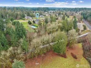 This home backs up to the Chehalis Western Trail with easy access through the neighborhood access point. Ride your bike to a winery this Summer.  What fun!