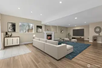 Downstairs, this huge finished recreation room provides space to gather and lounge, or fill this with ping pong and pool. Or add a wet bar down here to complete the entertainer's paradise.