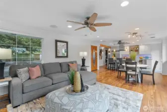 Open dining space with hardwood flooring and seamless flow to the living area—ideal for entertaining or multigenerational living.