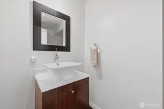 Powder room with Cristallo backlit stone counters