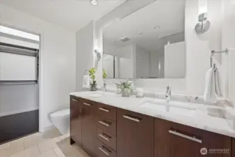 Primary bathroom w/ Cristallo backlit stone counters