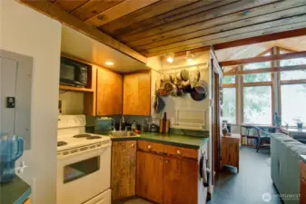 Quaint kitchen with all of the essentials.