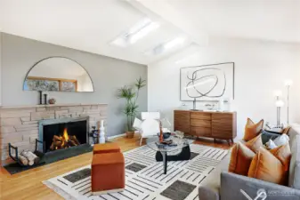 Cozy up next to the fireplace with your book under the skylights