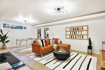 Lower level family room ready for movies, entertaining or game room.