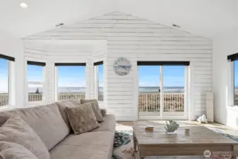 From the top floor living room, you'll enjoy gorgeous sunsets and endless ocean views.