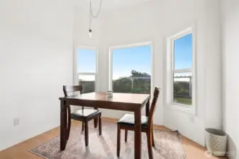 Entry level kitchenette with dining space.