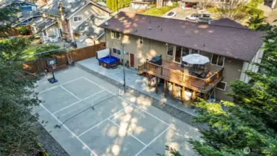 Sport Court and hot tub out back for year round fun.