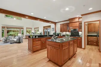 The chef's kitchen, complete with a butler's pantry, opens seamlessly to the great-room and sunroom, designed for effortless entertaining and everyday living.