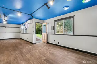 NEW lower level game room with yard access.