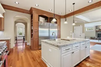 Tall ceiling heights, crown molding and slab granite counters.