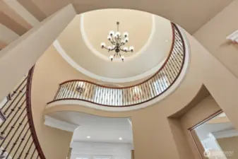 Opulent stairway in the foyer.