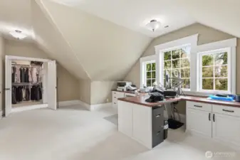 The office area tucked away off the primary suite or accessed from the bonus room.