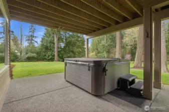 Hot tub on the patio off the rec room downstairs.