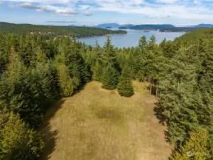 Above Mud Bay is this very private 7.2 acres.