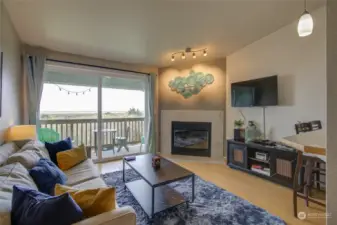 Moving into the living room, this is the spot you want to be!  Your ocean views and ocean air are right off your private balcony!