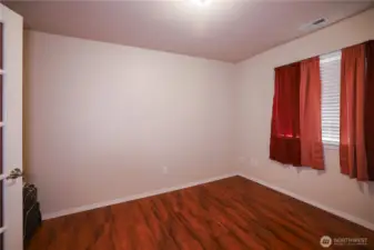 Roomy bedroom? Home Office? Craft Room? The double doors with the paned windows add a bit of class. Right off the kitchen, this room could be used for just about anything.