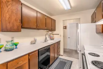 Kitchen with plenty of counter space, newer refrigerator.