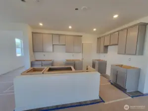 steel gray cabinets, actual home under construction.