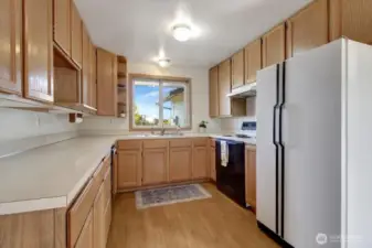 Spacious kitchen with views out the window to Mount Baker.